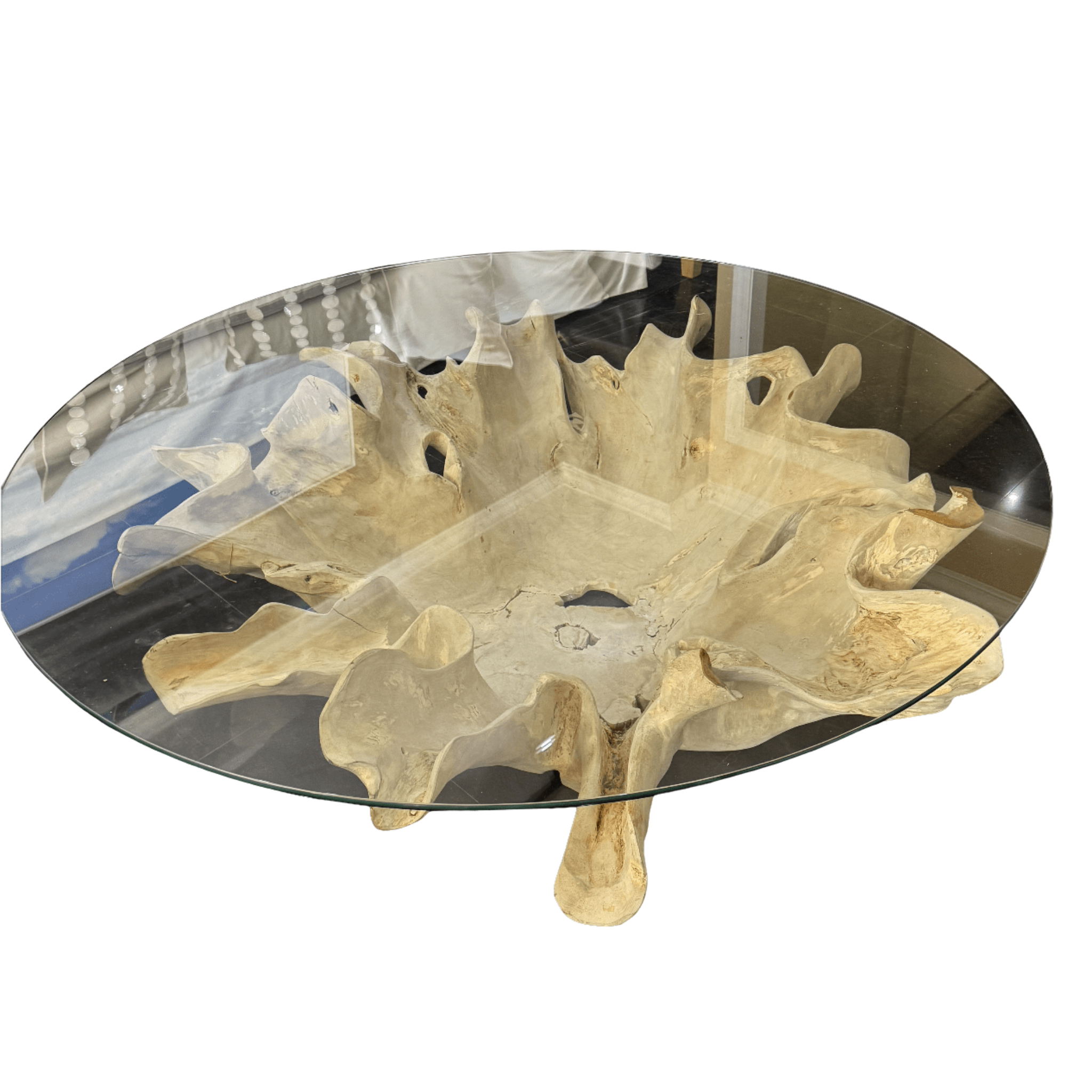 Glass coffee table with natural wood base on a white background