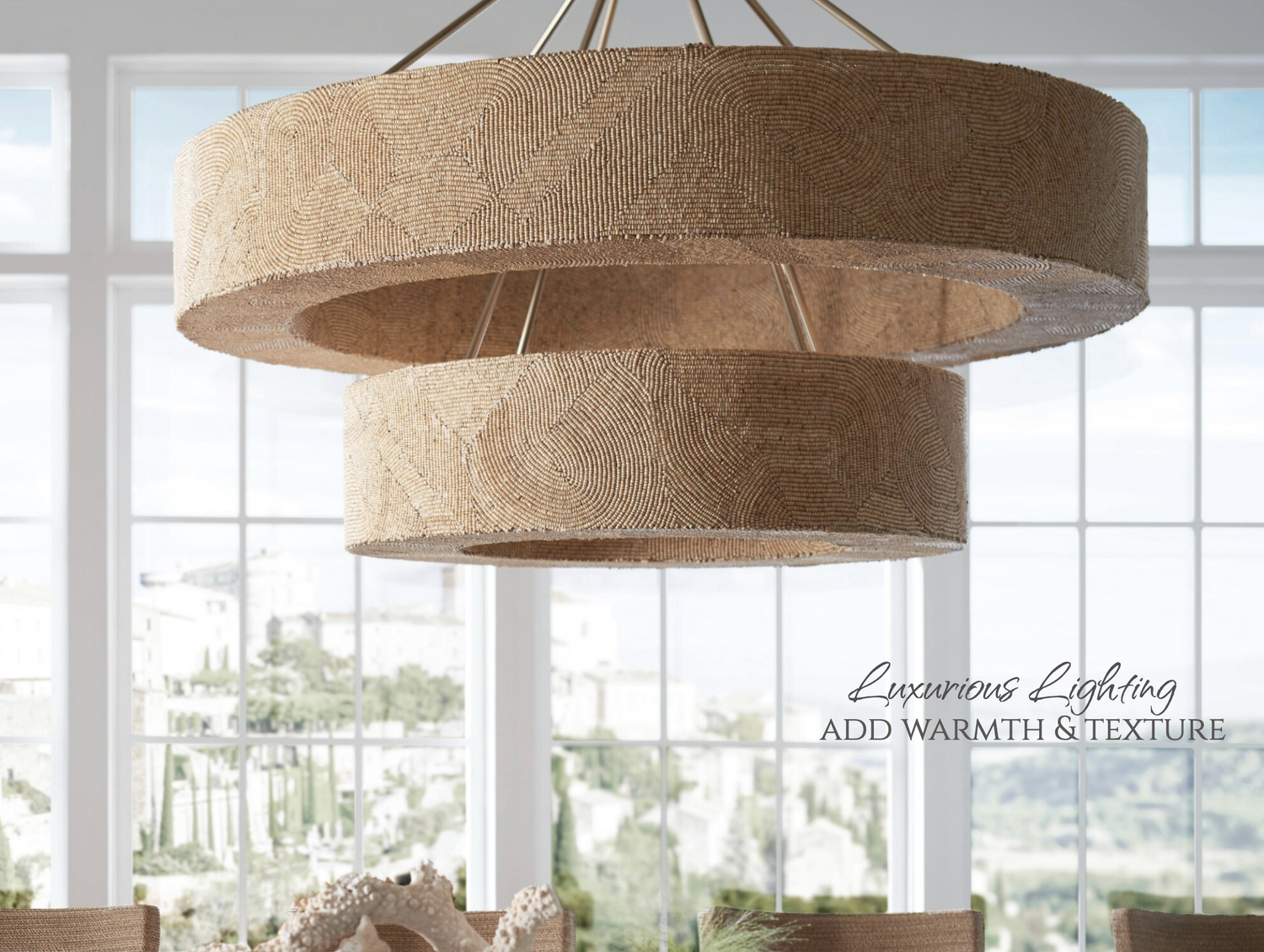 Chandelier with textured lampshades in a room with large windows