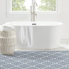 navy machine washable rug styled in bright coastal interior lifestyle